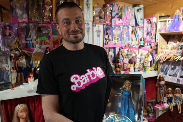 Giovanni Madonia with his Barbie collection in Felpham, West Sussex.