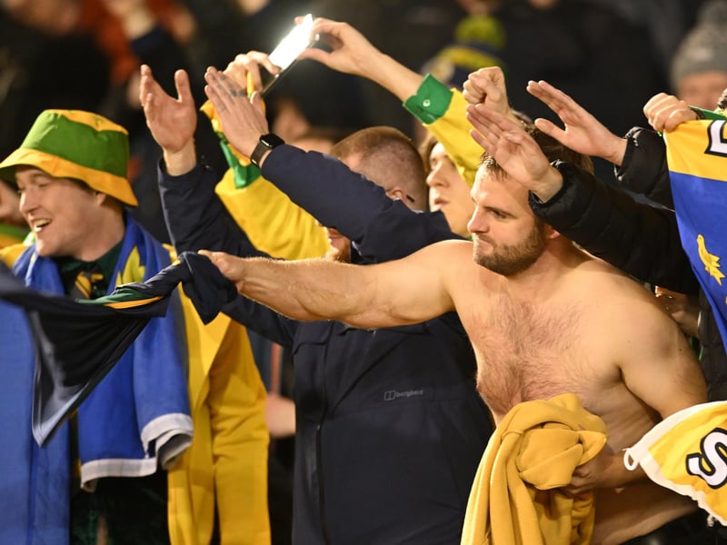 Horsham fans celebrating after the Emirates FA Cup First Round match between Barnsley and Horsham at Oakwell Stadium.