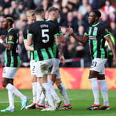 Danny Welbeck of Brighton & Hove Albion celebrates with teammates after scoring his team's second goal during the Premier League match at Sheffield United