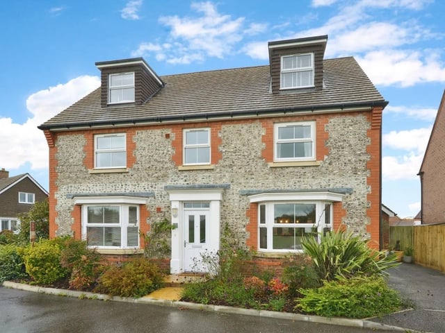 This detached five-bedroom detached house is up for sale in Hurstpierpoint through Yopa.