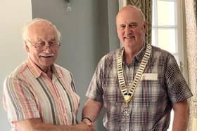 Graham Marsden (left) passing the chain of office to Alan Langley.
