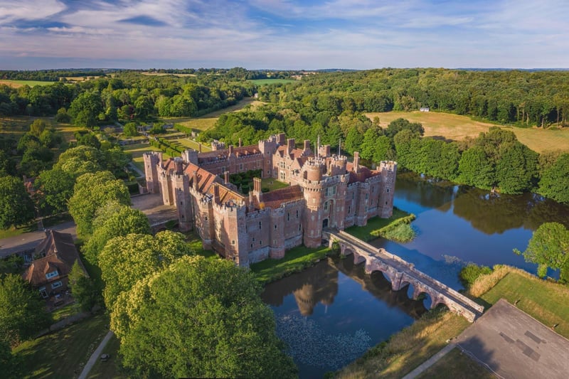 Herstmonceux Castle is a 15th century brick building and the 300-acre estate includes woodland, formal and themed gardens