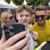 David Beckham poses for selfies with racing fans during the Goodwood Festival of Speed (Photo: John Nguyen /PA Wire)