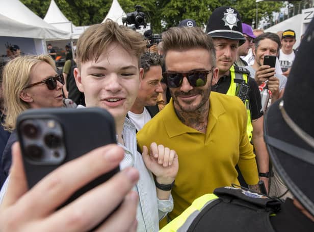 David Beckham poses for selfies with racing fans during the Goodwood Festival of Speed (Photo: John Nguyen /PA Wire)