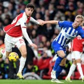 Kai Havertz of Arsenal battles for possession with Jan Paul van Hecke of Brighton & Hove Albion