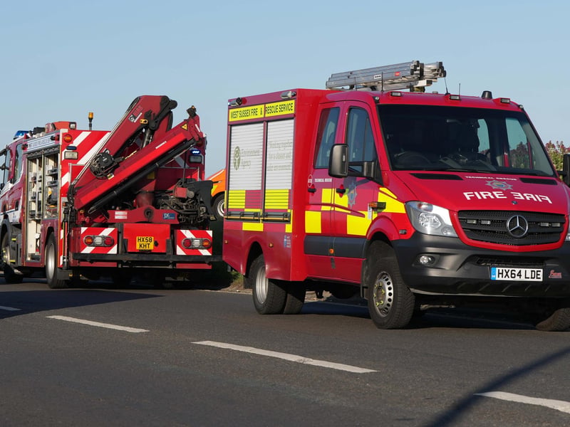 Police and the fire service helping at car on Worthing Beach on Monday evening, June 2