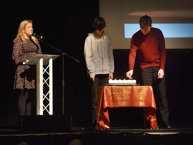 "Bridging Generations" Holocaust Memorial Day service at the White Rock Theatre in Hastings on January 24. L-R: Tamara Leggett and two Hastings Academy pupils Josh and Hamish.