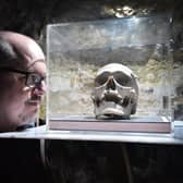 The True Crime Museum in Hastings: Curator Joel Griggs with the skull of Louis Lefevre