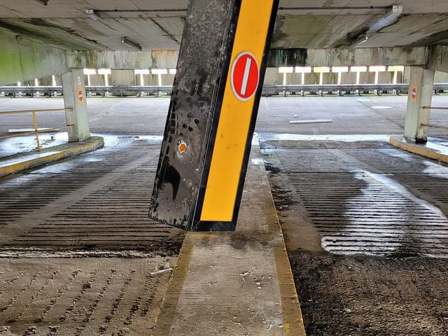A stop sign hanging from the ceiling.