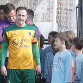 Gary Charman prepares to lead Horsham out in the final game of his career in March. Picture by John Lines