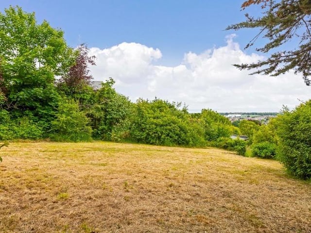 This substantial detached family house sits on the highest point in North Lancing, with grounds totalling 0.5 acres of land. Offers in the region of £1million are invited for this four-bedroom property at the foot of the South Downs National Park, with magnificent panoramic coastal views.