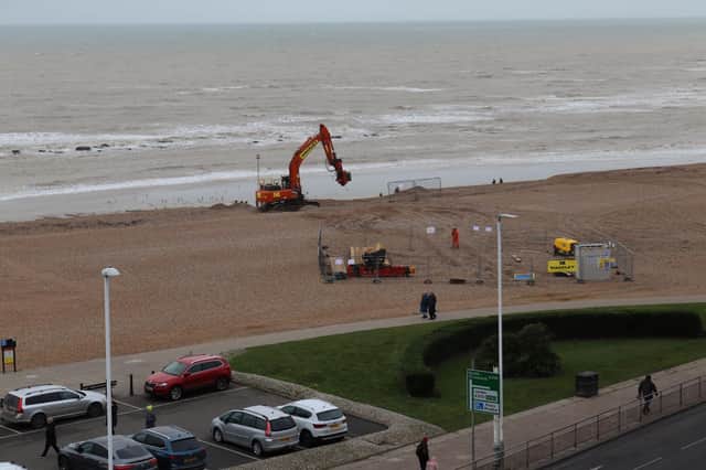 Works begin to reinstate part of the pipe on Pelham Beach, Hastings. Picture by Kevin Boorman