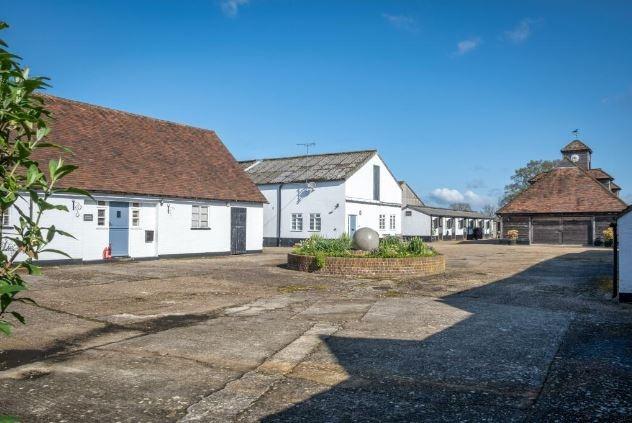 There are 12 stables along with a  number of store rooms, including a feed room and tack room.