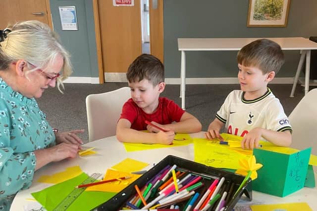 Hugo and Teddy get involved in Terry's Place craft activities