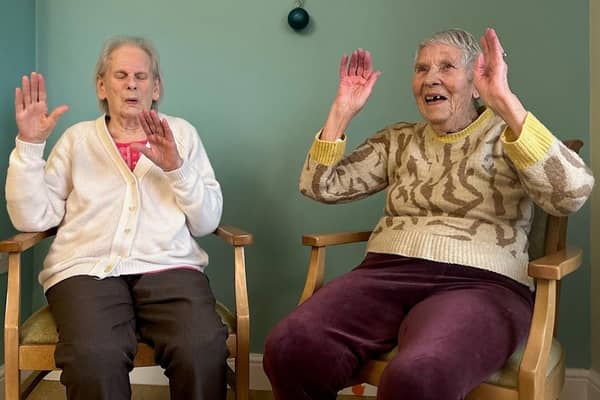 Guild Care residents taking part in chair exercise