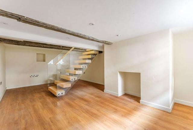The three bedrooms are spread across four floors.
