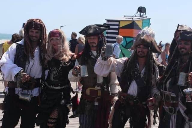 Pirates on the pier at last year's Pirate Day event.