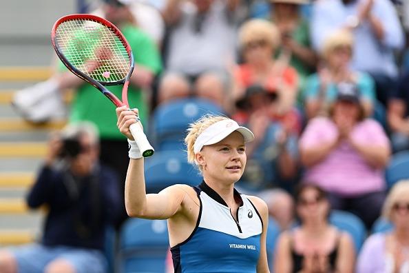 Harriet Dart of Great Britain celebrates winning match point against Zhang Shuai of China in the Women's Singles First Round match