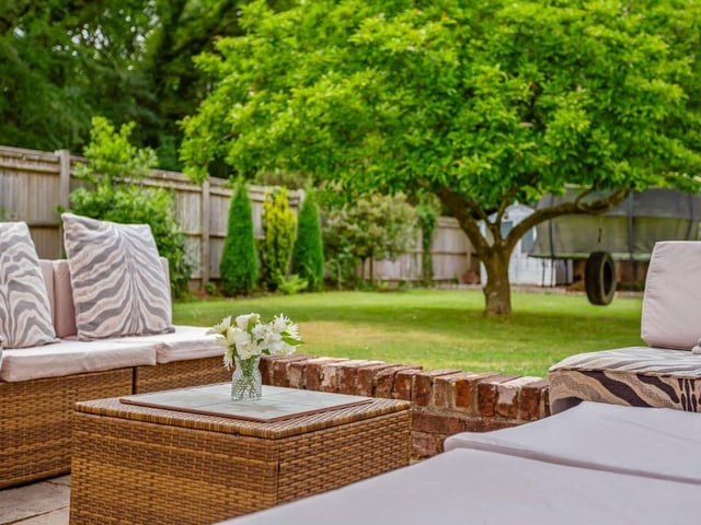 The spacious garden is perfect for summer.