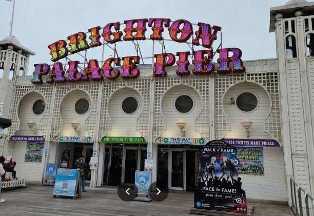 Iconic Victorian pier with amusement rides, arcades, and stunning seafront views