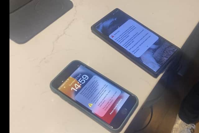 Two phones during the emergency alert