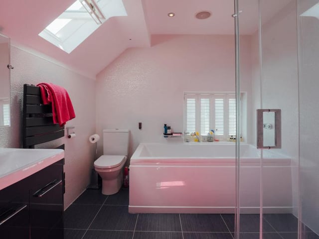 The main bathroom from a different angle. Clean and bright.