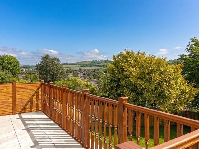 Offers in excess of £925,000 are invited for this new luxury property in Mill Lane, High Salvington. It has beautiful views over the South Downs, versatile and spacious accommodation.