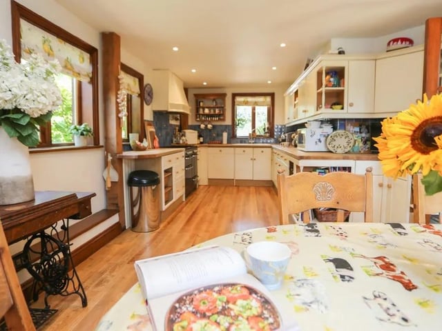 This five bed converted barn in Anmore Road, Denmead is on the market for £1.4m. It is listed on Zoopla by White & Guard Estate Agents.