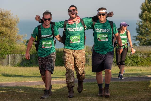 Walkers completing the Macmillan South Coast Mighty Hike at the weekend