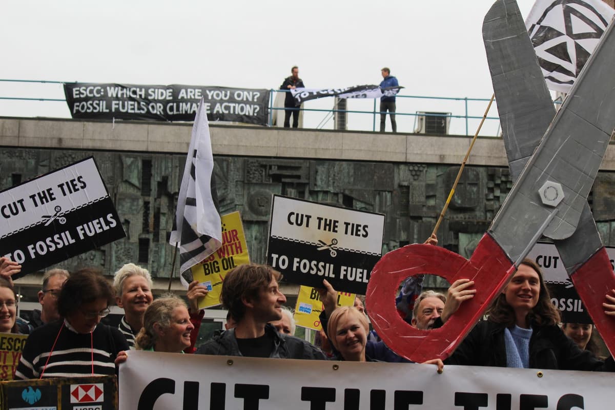 Protester Inti Extinction Rebellion activists scale roof of East Sussex County Council ...