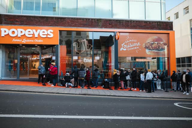 The opening queues outside the new Brighton branch of Popeyes