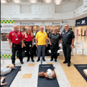 Shoppers learn CPR in the Beacon. Photo: South East Coast Ambulance Service NHS Foundation Trust