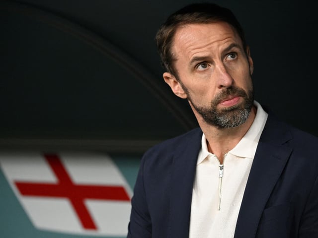 TOPSHOT - England's coach Gareth Southgate looks on ahead of during the Qatar 2022 World Cup Group B football match between Wales and England at the Ahmad Bin Ali Stadium in Al-Rayyan, west of Doha on November 29, 2022. (Photo by Ina Fassbender / AFP) (Photo by INA FASSBENDER/AFP via Getty Images)