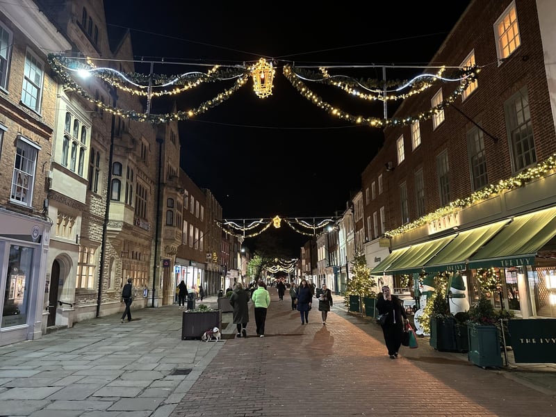 Evening shoppers soak up the atmosphere.