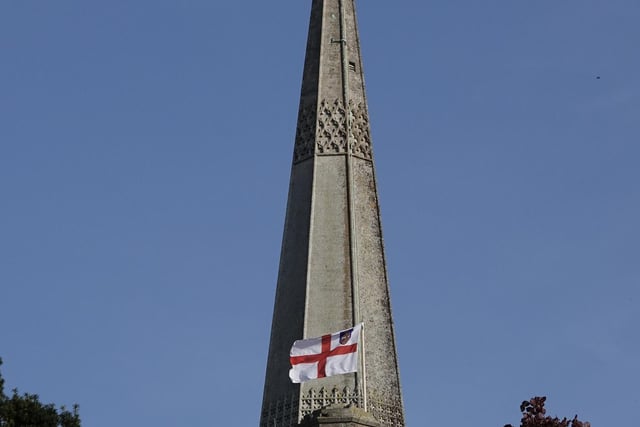 A shot of the flag with the full Cathedral spire in Chichester for the Coronation.