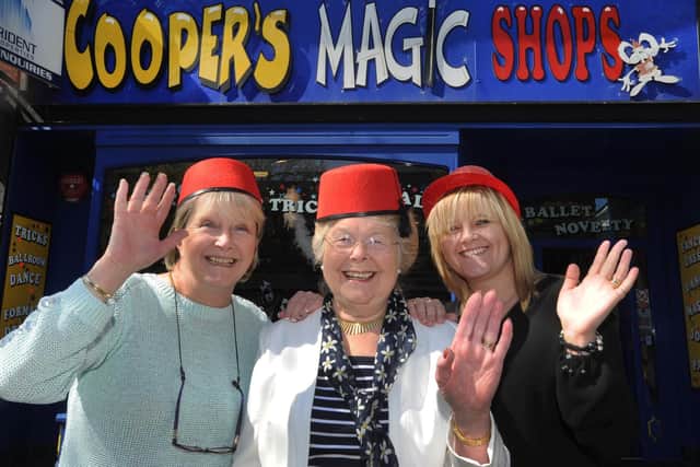 Tributes to Sabrina Cooper (left) - photo from 2017 outside The Cooper's Magic Shop (Photo by Jon Rigby)