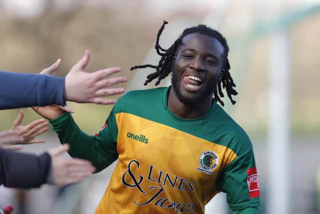 It's high fives all round as Daniel Ajakaiye completes his first half hat-trick in Horsham's 4-1 home win over Bowers & Pitsea. Pictures by John Lines
