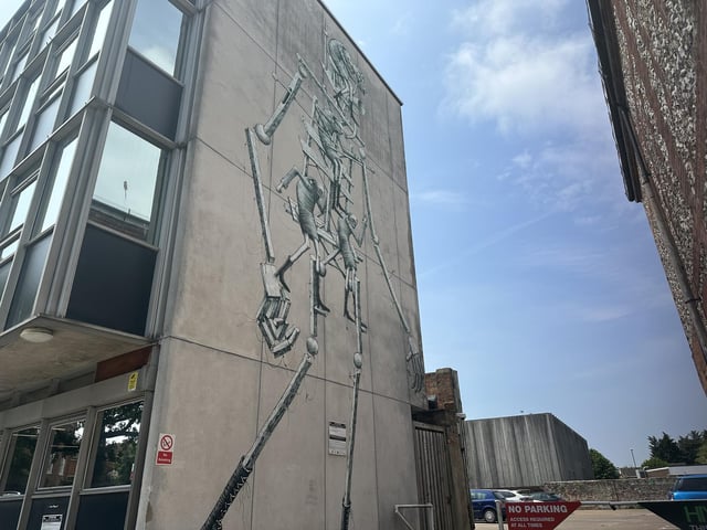 Welsh-born, but Sheffield-based artist Phlegm breathed life into this wall near Chichester's metro house.