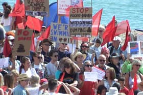 Clean Water Action Group's protest against sewage discharges on Aug 26 on the beach behind Azur, St Leonards. Photo by Roberts Photographic.