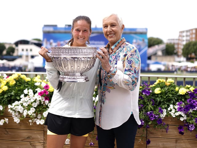 Daria Kasatkina poses with the Eastbourne trophy with tennis legend Martina Navratilova following victory against Leylah Annie Fernandez of Canada in the women's singles