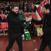 Arsenal Manager Mikel Arteta shakes hands with Brighton head coach Roberto De Zerbi