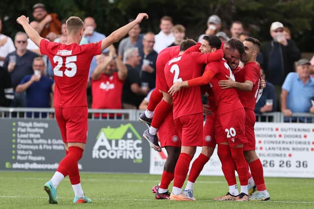 Players and fans celebrate one of the Worthing goals which beat Weymouth | Picture: Mike Gunn