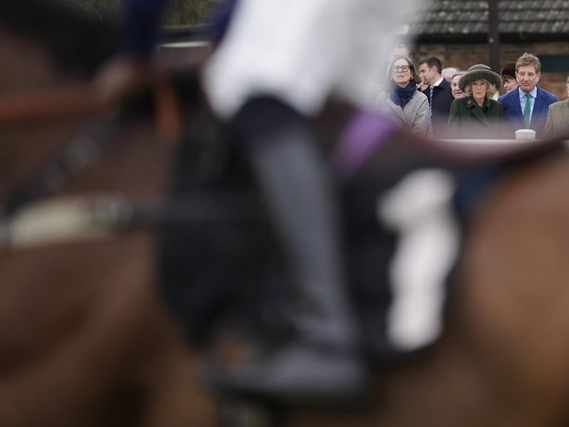 PLUMPTON, ENGLAND - FEBRUARY 23: Queen Camilla watches The Johnnie Boden Backs Jamie's Farm Amateur Jockeys' Handicap Chase during a visit for a charity event at Plumpton Racecourse on February 23, 2026 in Plumpton, England. (Photo by Alan Crowhurst/Getty Images) : Queen Camilla watches The Johnnie Boden Backs Jamie's Farm Amateur Jockeys' Handicap Chase at Plumpton
