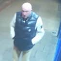 Police investigating a report of an assault in Worthing have issued an image of a man they wish to speak to. Photo: Sussex Police