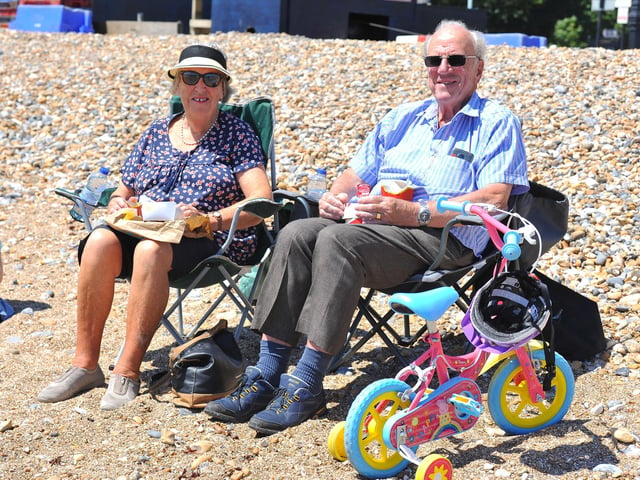 Enjoying the heatwave on Worthing beach. Pic S Robards SR2206152