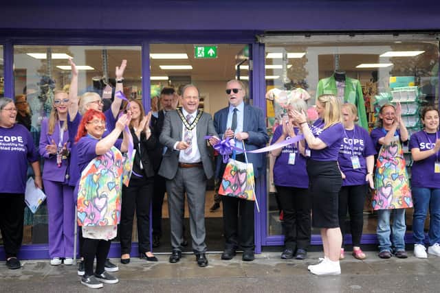 Town Mayor Francis Oppler opens the newly refurbished Scope charity shop. Photo: The Photography Lounge Chichester