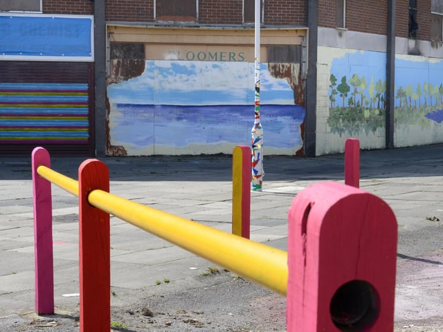 Railings, posts and planters were all spruced up by volunteers