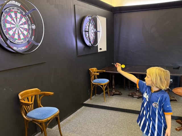 The idea of the 'dartathon' fundraiser stemmed from Rayfe's love of darts. a