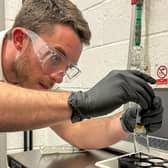 Planet Ocean representative preparing a seawater sample for analysis. Photo: Worthing Borough Council
