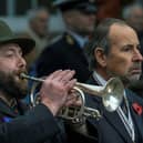 A bugle player sounds The Last Post